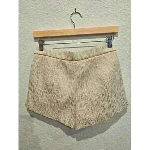 Forever 21 White and gold mini shorts. Size Small.
